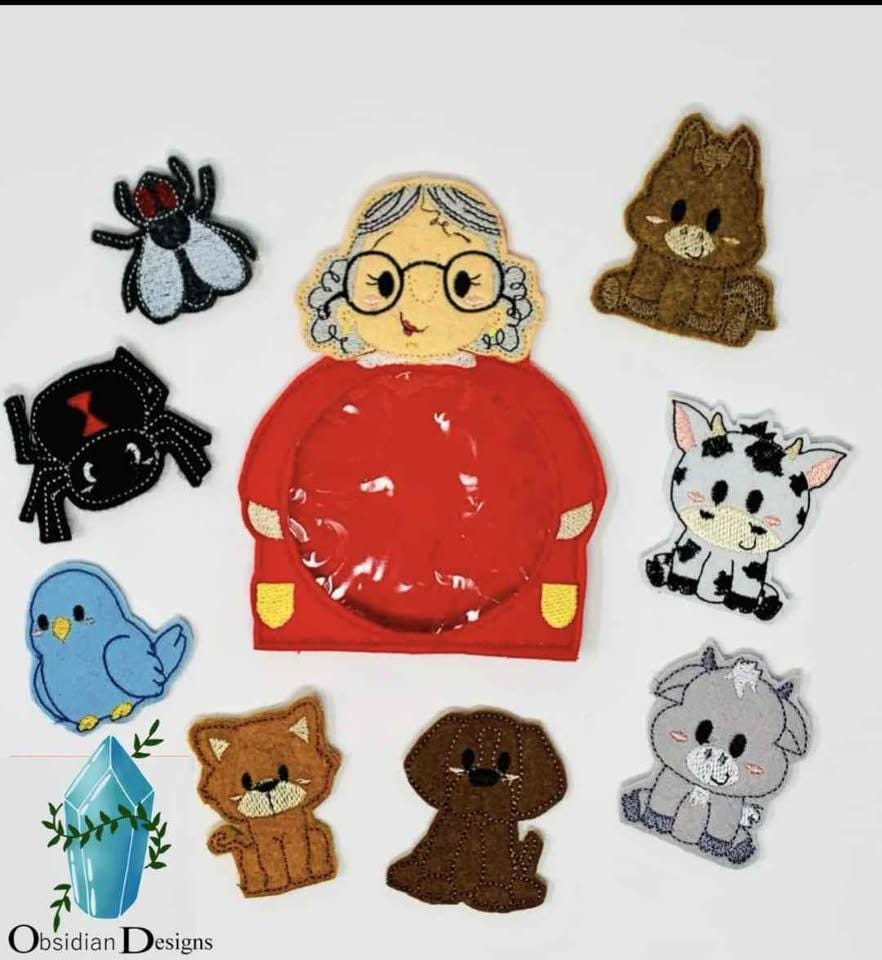 Old Lady who swallowed the fly felt story finger puppets circle time stories role playing dramatic play animals spider bird cat dog goat cow